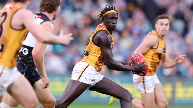 Hawthorn defender Changkuoth Jiath was subbed out during the third quarter of his return after Mitchell said he ‘couldn’t control’ his running loads and was at risk of another injury. Picture: Sarah Reed / Getty Images