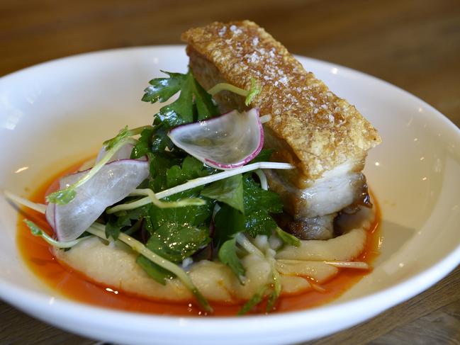 Pork belly with chilli oil and celeriac puree. Picture: Andrew Henshaw