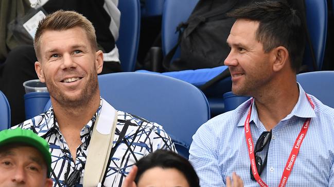 David Warner and Ricky Ponting take in the tennis. Picture: AAP Images 