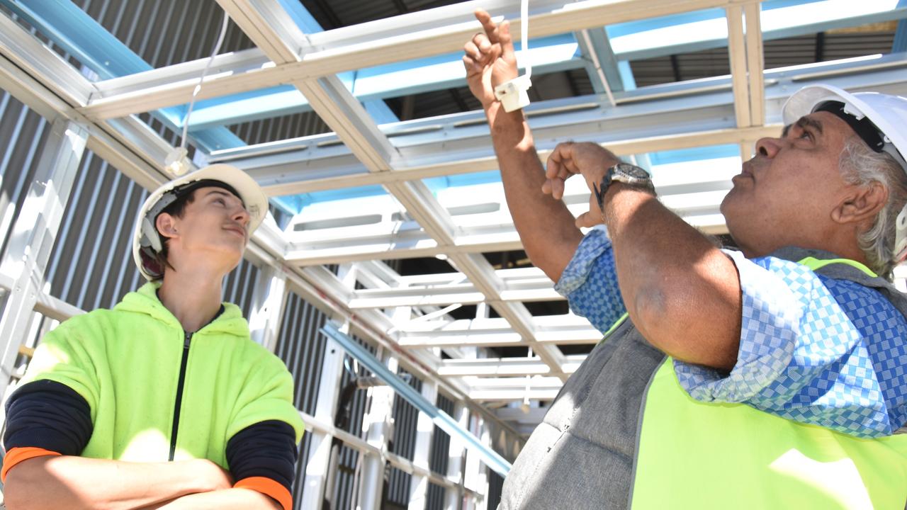 Inspecting work on the new Manjali Studio School that will be located in the southern West Kimberley of Western Australia is (from left) Hutchinson Builders Toowoomba apprentice Blake Hicks and Bunuba Dawangarri Aboriginal Corporation director Kevin Oscar.