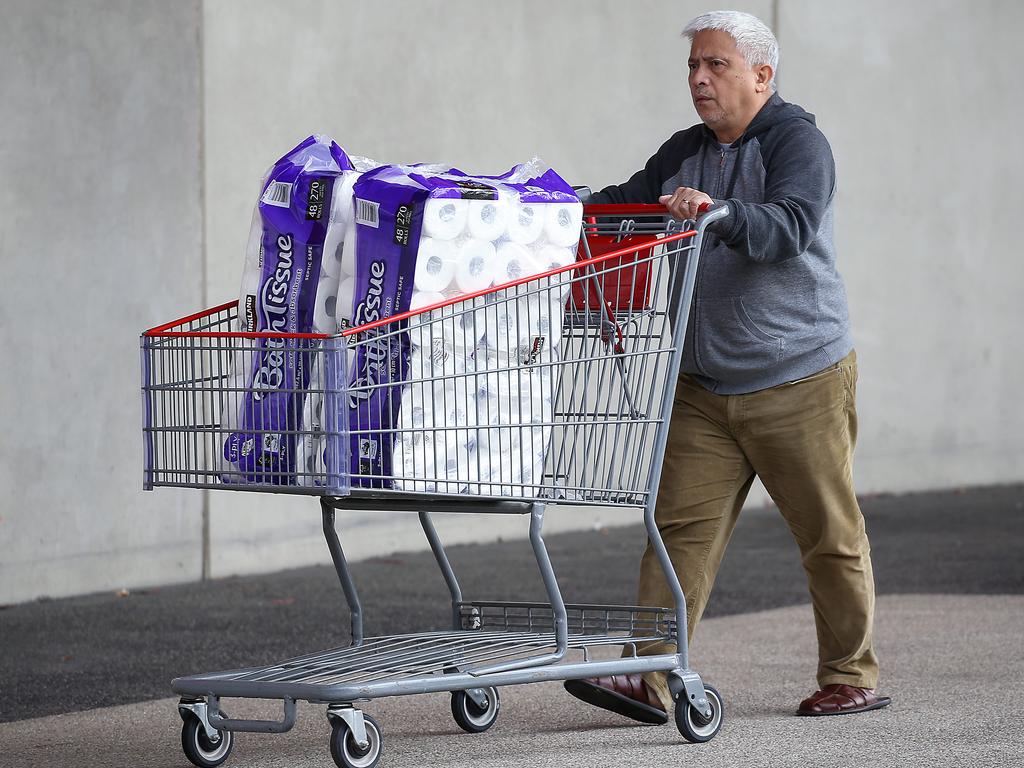 People rush to stockpile toilet paper and food at Costco in Docklands as the COVID-19 virus continues to cause panic around the world. Picture: Ian Currie