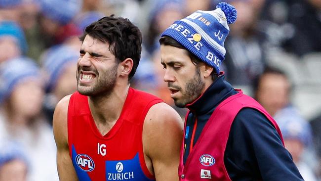 MELBOURNE, AUSTRALIA - JUNE 10: Christian Petracca of the Demons leaves the field injured during the 2024 AFL Round 13 match between the Collingwood Magpies and the Melbourne Demons at The Melbourne Cricket Ground on June 10, 2024 in Melbourne, Australia. (Photo by Dylan Burns/AFL Photos via Getty Images)