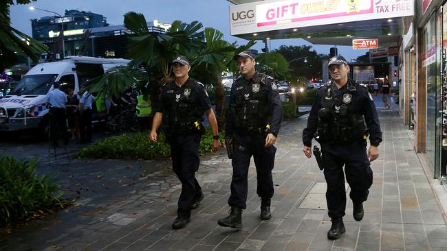 Sergeant Steve Heemi, Senior Constable Andrew Greenwood and Senior Constable Richie Manning on patrol in Shield Street during Operation Romeo Paso. PICTURE: STEWART MCLEAN