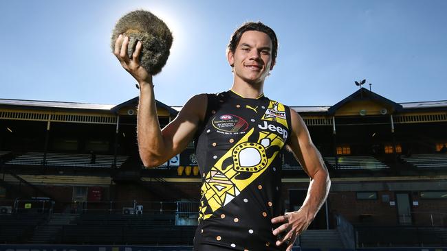 Richmond star Daniel Rioli with the Indigenous Round Dreamtime jumper he designed with his parents in the Tiwi Islands. Picture: David Caird