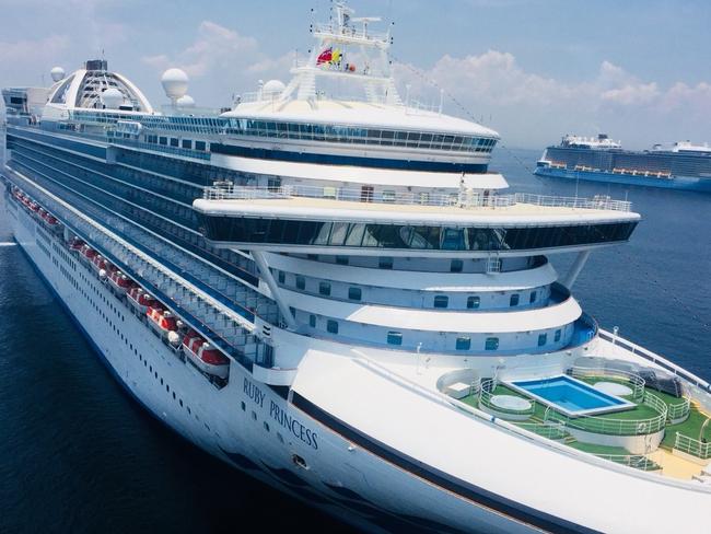 Cruise ship Ruby Princess as it is anchored in Manila Bay as seen from Cavite province, Philippines, Thursday, May 7, 2020. The cruise ship being investigated in Australia for sparking coronavirus infections has sailed into Philippine water to bring Filipino crewmen home.