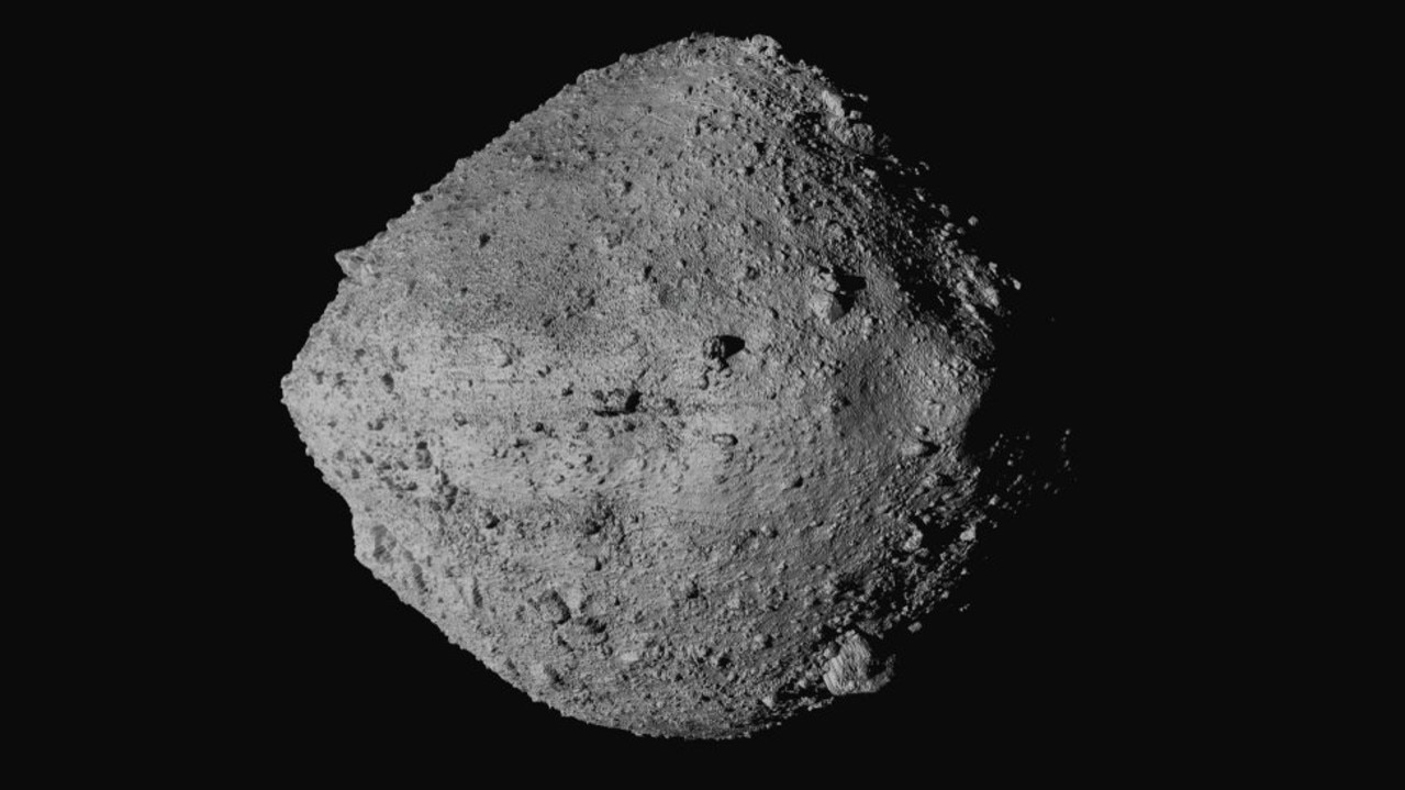 This undated image made available by NASA shows the asteroid Bennu from the OSIRIS-REx spacecraft. After almost two years circling the ancient asteroid, OSIRIS-REx will attempt to descend to the treacherous, boulder-packed surface and snatch a handful of rubble on Tuesday, Oct. 20, 2020. (NASA/Goddard/University of Arizona/CSA/York/MDA via AP)