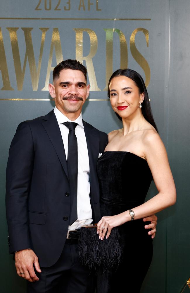 Charlie Cameron of the Lions and Caitlin Seeto. Picture: Getty