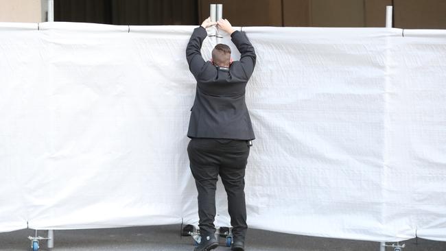 Security at the Sofitel in Brisbane wait for the Australian and Indian cricket teams to arrive for the 4th test against India at the Gabba on Friday. Picture Lachie Millard