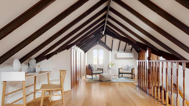 The upstairs studio includes an ensuite, kitchenette, storage space and a balcony.