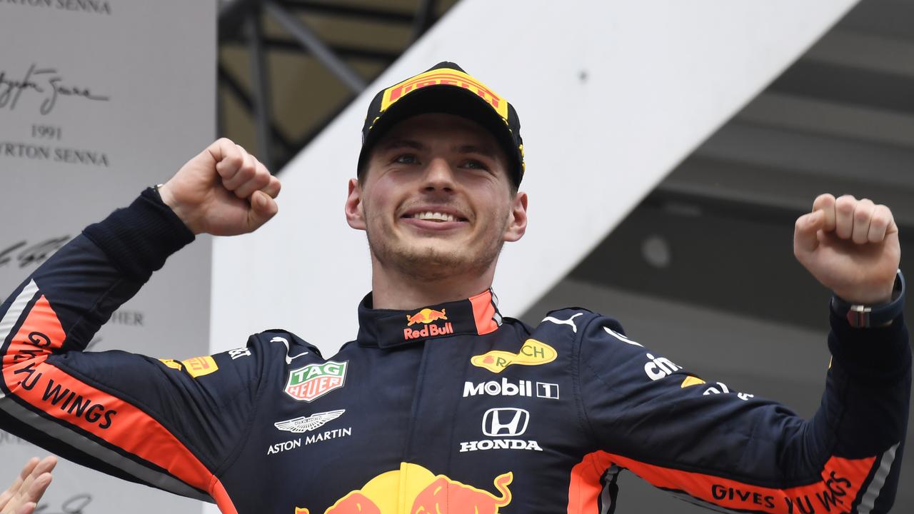 Max Verstappen celebrates on the podium after he won at the Hockenheimring.