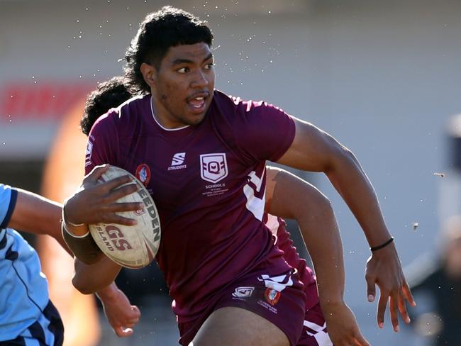 QLD's Elekana Suavai makes a break during the under 18 ASSRL schoolboy rugby league championship grand final between QLD v NSW CHS from Moreton Daily Stadium, Redcliffe.  Picture: Zak Simmonds