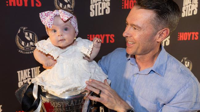 Craig McRae with his daughter Maggie at the premiere of Collingwood’s premiership documentary at Hoyts Melbourne Central on Wednesday night. Picture: Jason Edwards