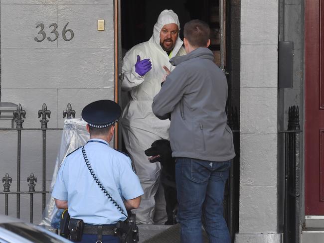 Forensic investigators at work at the crime scene established in Surry hills. Picture: AAP/Sam Mooy