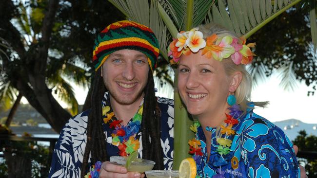 Brad Davis and Courtney Tuck of the Airlie Beach Hotel get set to party Parrothead style at the street party on Sunday 17 August. (12/08/2008)