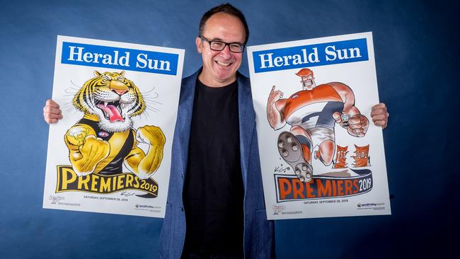 Tiges or Giants? Visit Mark Knight signing the 2019 posters on Sunday at the MCG Open Day from 11am to 2pm (inside Gate 2). Picture: Jake Nowakowski