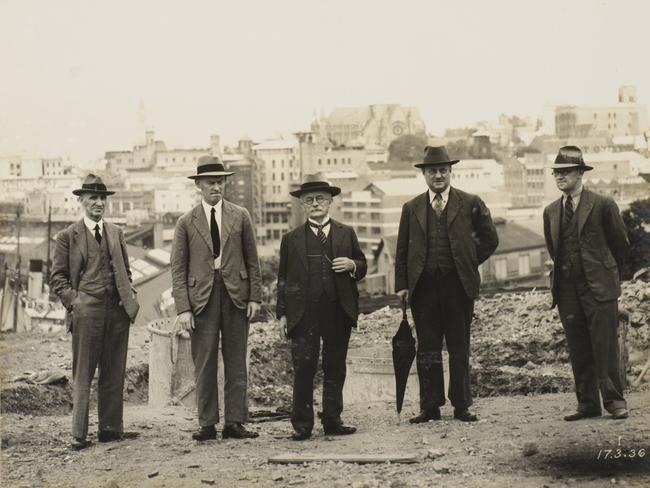 Engineer Dr John Bradfield (centre) flanked by fellow members of the Bridge Board during construction of Brisbane's Story Bridge in June 1936. Picture: State Library of Queensland