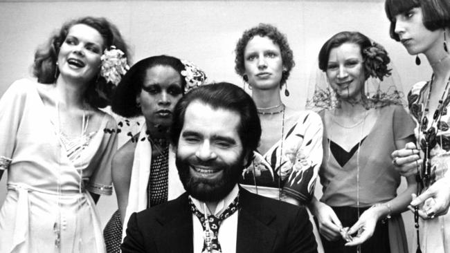 Lagerfeld with models in Krefeld, West Germany, in 1973. Picture: AP