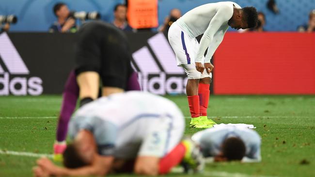 England’s players react to losing to Iceland.