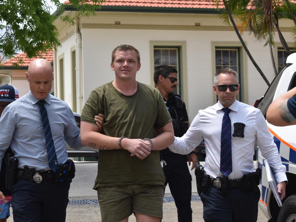 James George De Marco being walked to the Rockhampton Watch House on January 17 2024. He was charged with the alleged murder of Anuisha Bone.