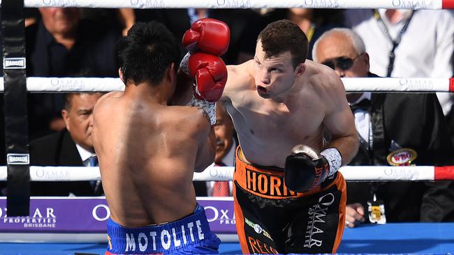 Australia's Jeff Horn (right) and Manny Pacquiao of the Philippines fight during their WBO World Welterweight title fight at Suncorp Stadium in Brisbane, Sunday, July 2, 2017. (AAP Image/Dan Peled) NO ARCHIVING, EDITORIAL USE ONLY