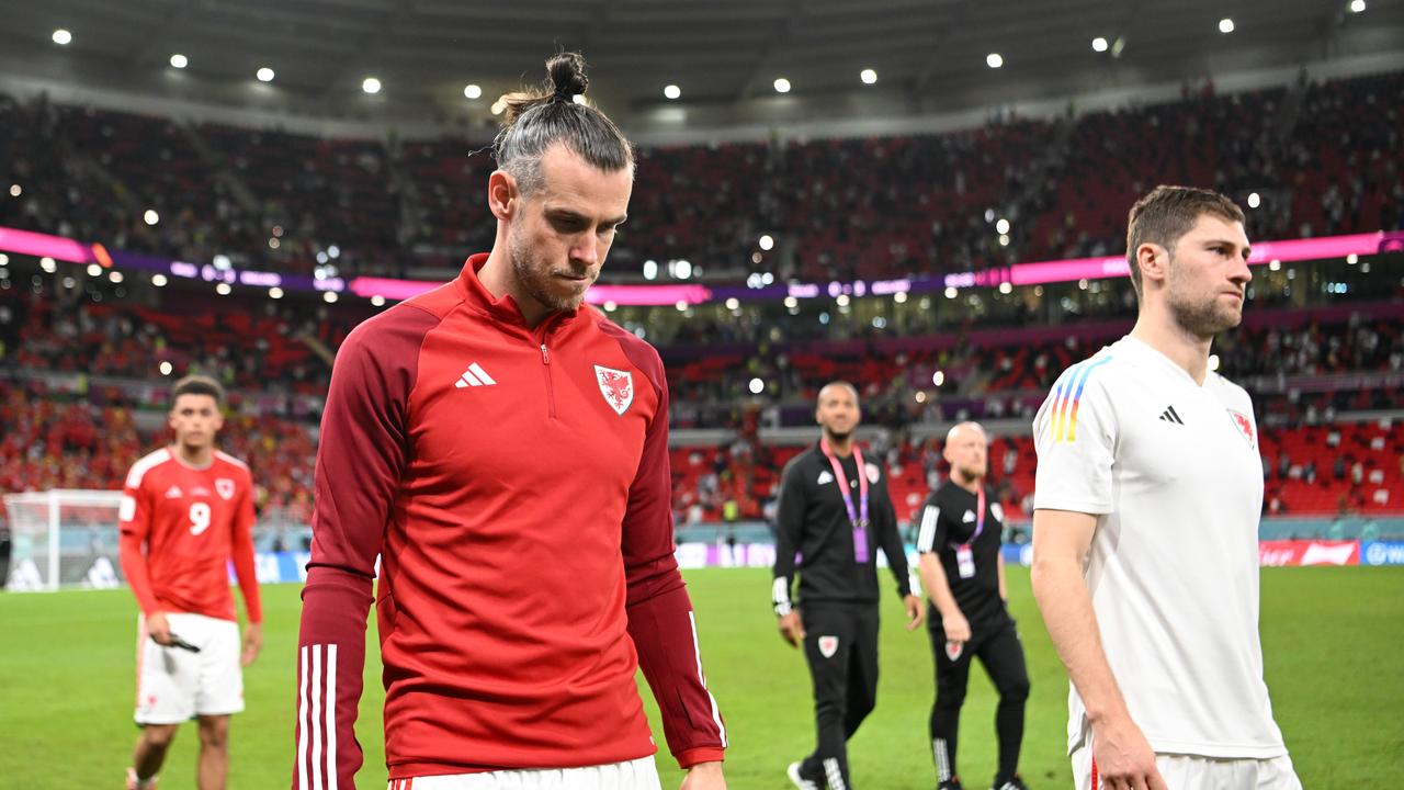 Gareth Bale of Wales looks dejected following their side's defeat in the FIFA World Cup Qatar 2022 Group B match between Wales and England. (Photo by Shaun Botterill - FIFA/FIFA via Getty Images)