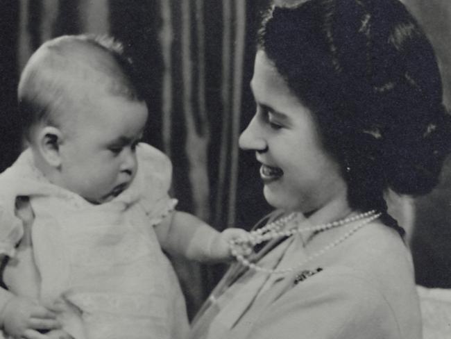 The future Queen Elizabeth II and her firstborn, Charles Prince of Wales.