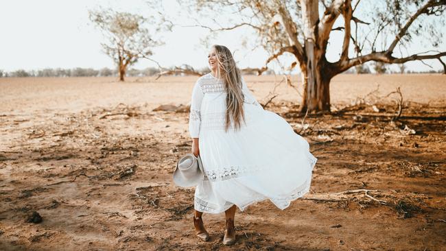 Annabelle Kennedy, 29, from a drought-stricken farm in central NSW, is working full-time to keep up with demand for her linen clothing brand Kennedy The Label, Picture: Clancy Job