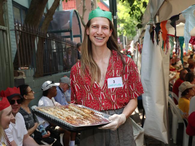 Volunteer Christian Wilkins serving food at the annual Wayside Chapel's Christmas Party for the Homeless in Potts Point. Picture: Richard Dobson