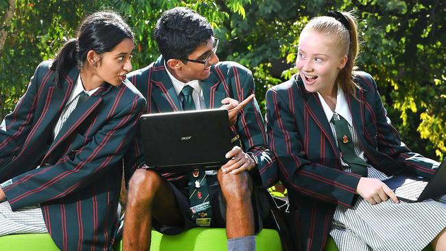 St Paul’s Bald Hills students Shruthikaa Suresh, Praanav Pratap and Luella Jensen. (Picture: John Gass/AAP