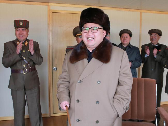 North Korean leader Kim Jong-un inspects the test of a new-type anti-air guided weapon system.