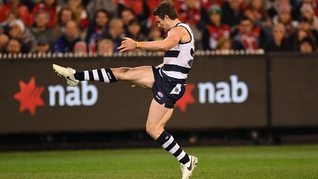Patrick Dangerfield of the Cats kicks a goal on Friday night. Picture: AAP