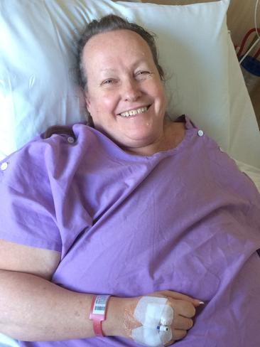 Yvonne Salo recovering after having her left arm amputated at the Gold Coast University Hospital, still in happy spirits.