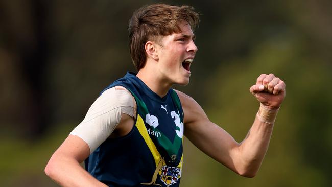 MELBOURNE, AUSTRALIA - APRIL 13: Archie Ludowyke of the AFL National Academy celebrates kicking a goal during the Marsh AFL National Academy Boys match between Australia U18 and Richmond VFL at RSEA Park on April 13, 2025 in Melbourne, Australia. (Photo by Josh Chadwick/AFL Photos/via Getty Images)