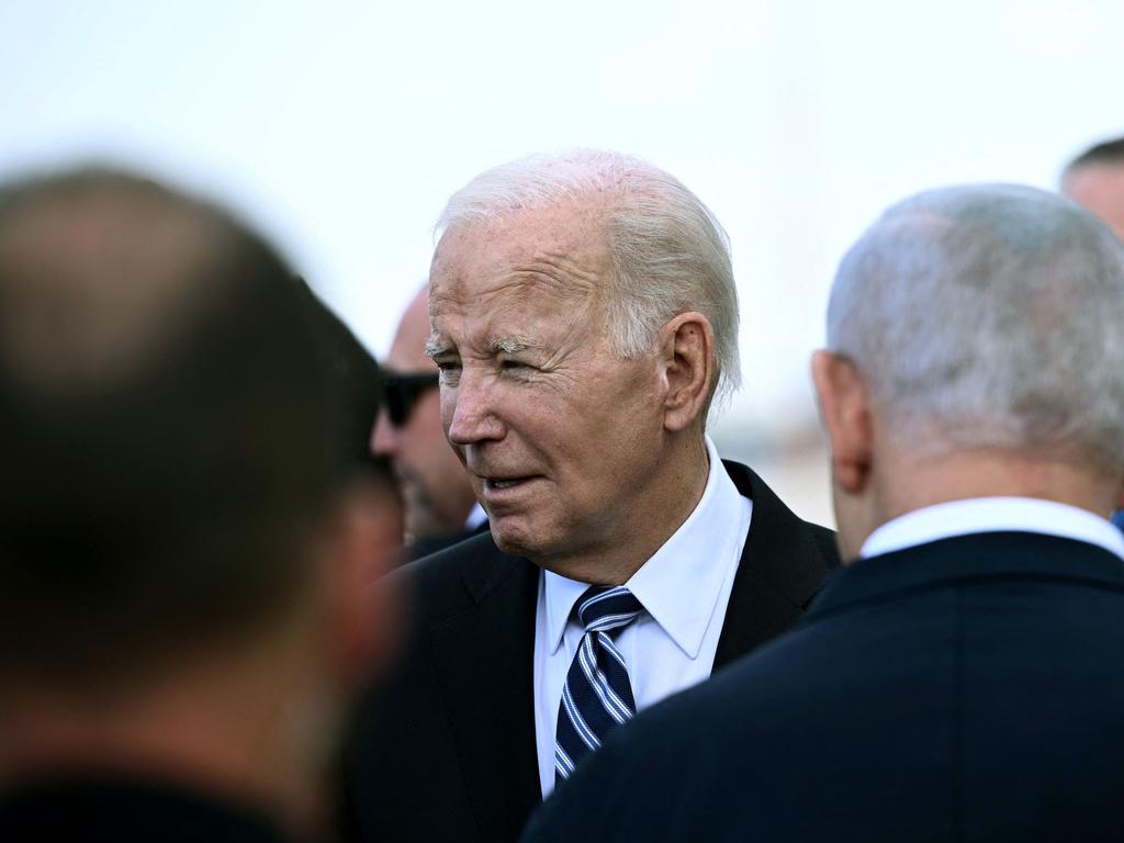 Israel Prime Minister Benjamin Netanyahu greets US President Joe Biden upon his arrival at Tel Aviv’s Ben Gurion airport on October 18. Picture: AFP