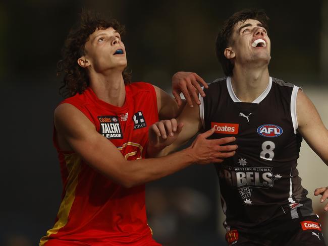 Ethan Read of the Suns and Jonty Faull of the Rebels. Picture: Daniel Pockett/AFL Photos/via Getty Images.