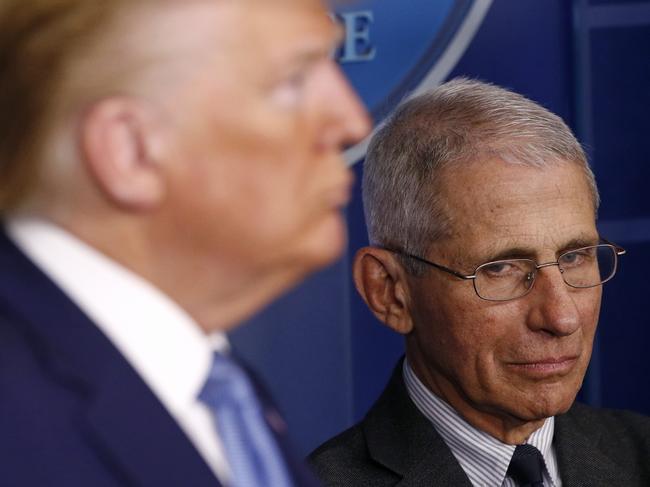 Director of the National Institute of Allergy and Infectious Diseases Dr Anthony Fauci and President Donald Trump. Picture: AP