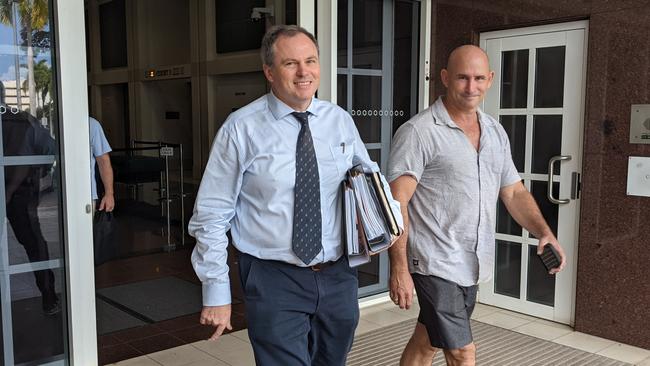 Lawyer Danial Kelly, left, leaving Darwin's Supreme Court following a directions hearing challenging the NT Government's vaccine mandate on Wednesday December 22. Picture: Zizi Averill