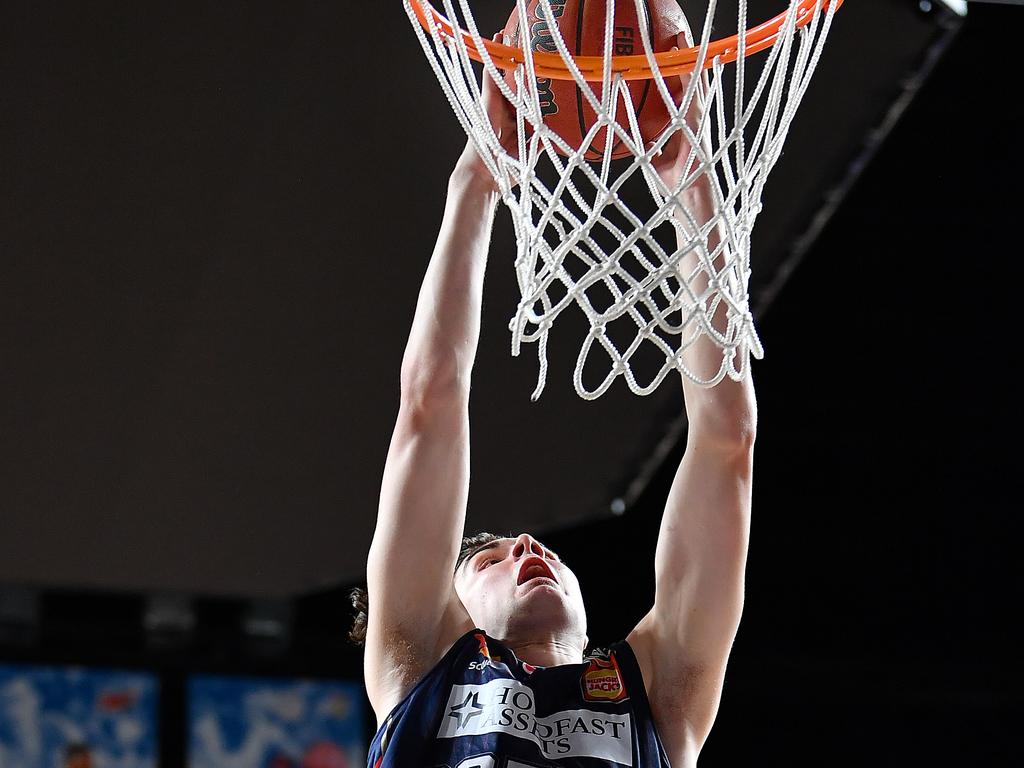 Josh Giddey slam dunks against the South East Melbourne Phoenix. Picture: Mark Brake/Getty Images