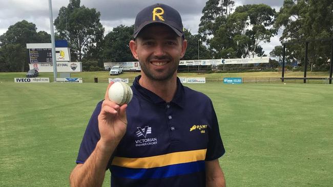 Having a ball: Ian Holland after taking his hat-trick for Ringwood.