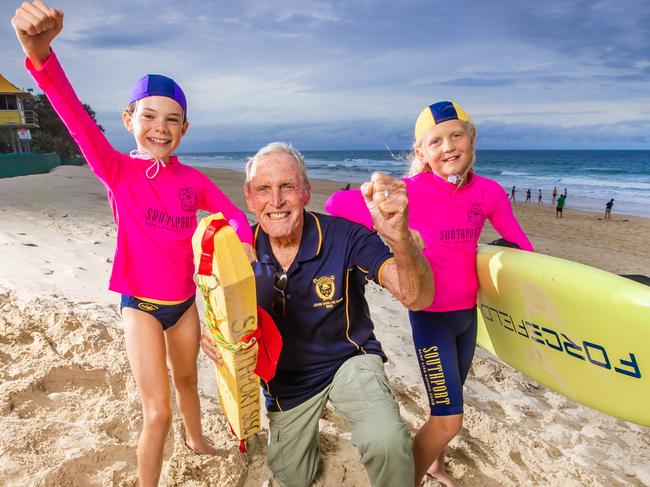 Southport Surf Club life member John Ogilvie with nippers Imogen Coman, 10 and Dean Olsen, 11 ahead of the club's 100-year anniversary celebrations this weekend.Picture: Nigel Hallett