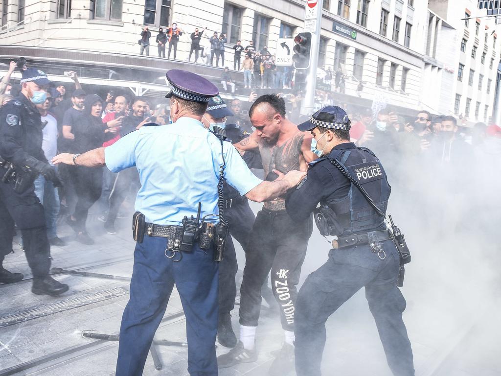 Protesters clash with police in the Sydney CBD. Picture: NCA NewsWire/Flavio Brancaleone