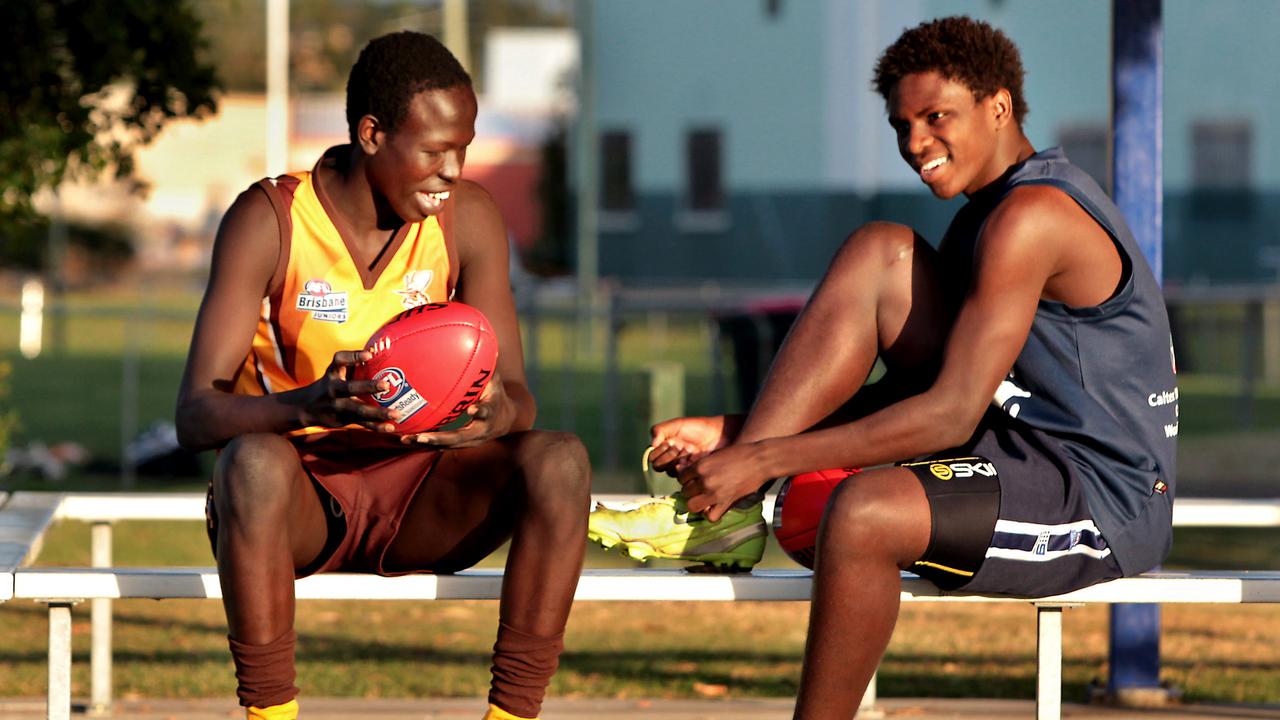 A 16 year old Aliir Aliir (left) after being selected for the World Team at the national championships.