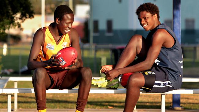 A 16 year old Aliir Aliir (left) after being selected for the World Team at the national championships.