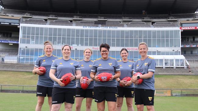 Hawthorn's all-female VFLW coaching panel at Waverley Park. Bec Goddard (centre), assistant coaches Christina Polatajko and Hayley Gregory with development coaches Lou Wotton, Natasha Beck and Steph Carroll. Picture: Supplied/Hawthorn FC