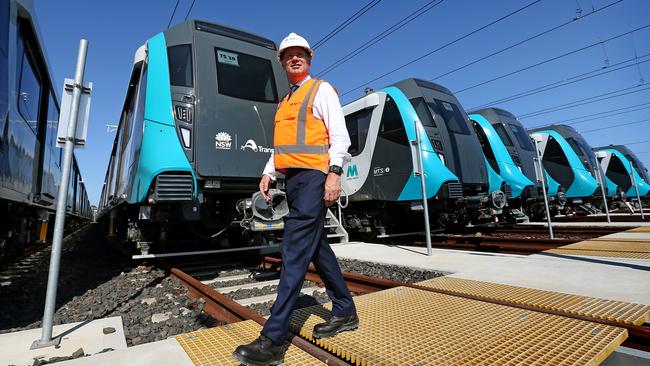 Sydney Metro CEO Jon Lamonte at the marshalling yard at Rouse Hill in front of the new metro trains that will come into operation this month. Picture: Toby Zerna