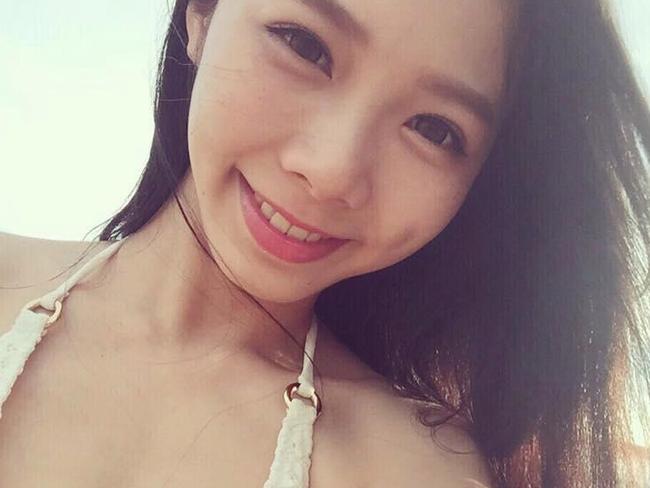 World's most beautiful dental nurse - Ning Chen, 25, became a huge hit in her native Taiwan after seductive snaps of her posing in her pink uniform took the web by storm. Picture: Viral Press