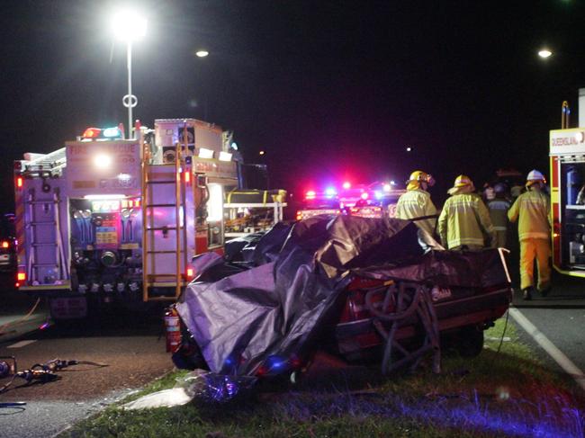 08/05/09   182503 Fatal accident on the corner of Nambour Connection Road and Blackall Terrace at Woombye. It is believed at this stage that an elderly lady and two toddlers from one vehicle died, along with the male occupant of the other car. Photo: Brett Wortman / Sunshine Coast Daily