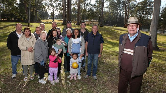 Moorebank resident Herb Taylor and locals say the memorial sculpture is incompatible with Clinches Pond, a nature reserve. Picture: Robert Pozo