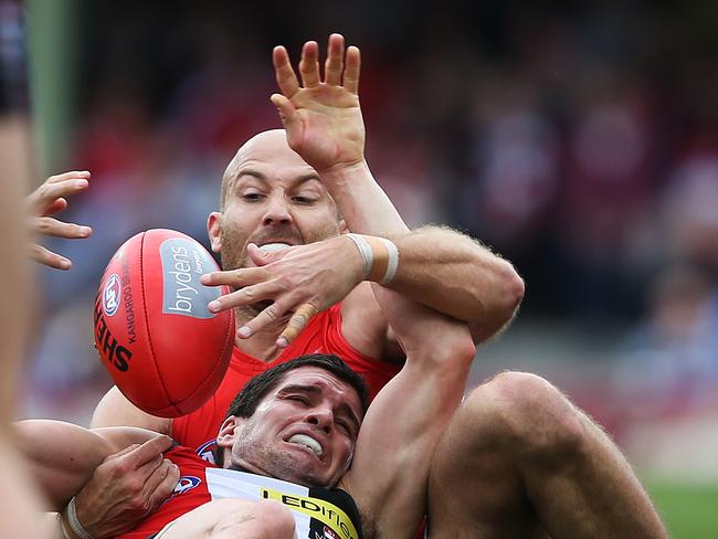 Jarrad McVeigh and Leigh Montagna battle for the footy. Picture: Phil Hillyard