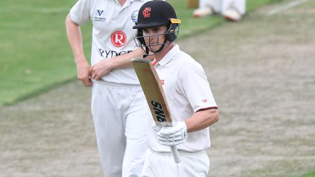 James Seymour raises the bat for Essendon. Picture: Julian Smith